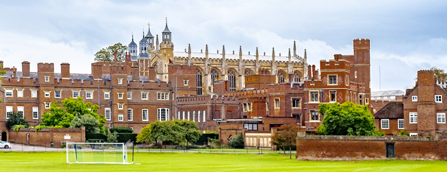 Red stone building with green - Eton College